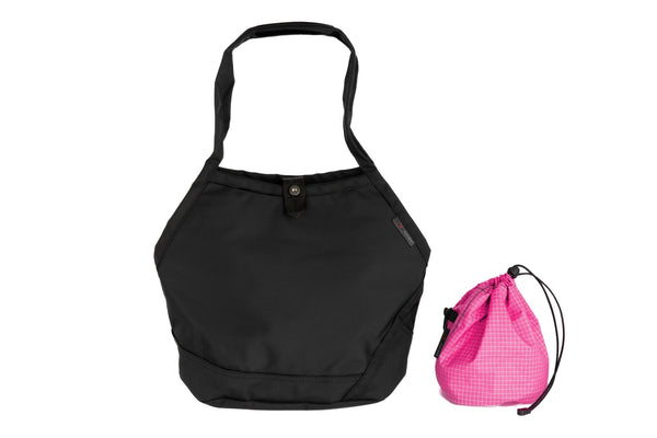 A Swift in Black Ballistic with Cerise (bright pink with white grid) 200 Halcyon interior and Yarn Stuff Sack.
